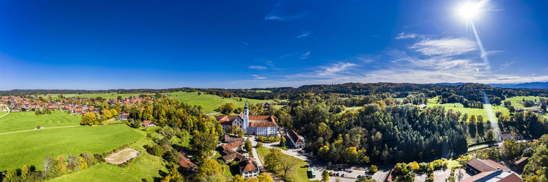 Panoramic view of landscape and buildings against sky