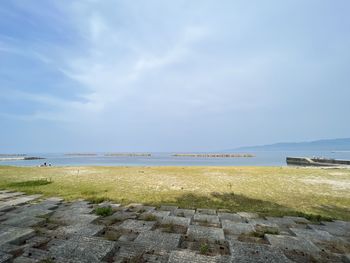 Scenic view of beach against sky