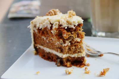 Close-up of carrot cake in plate on table