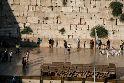 Group of people in front of historical building