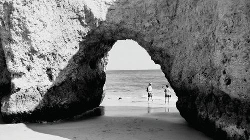 Scenic view of sea seen through rock formation