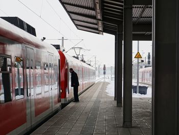 Train on railroad station platform in city