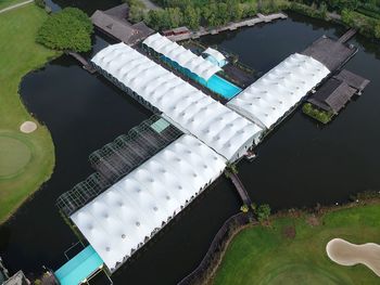 High angle view of dam floating on lake