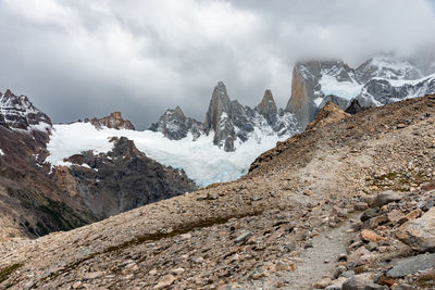 Scenic view of snowcapped mountains against sky