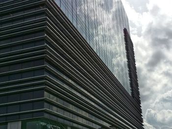 Low angle view of modern building against sky