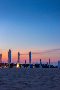 Scenic view of sea against clear sky during sunset