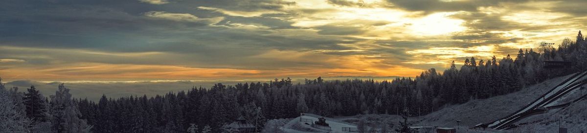 Panoramic view of landscape against sky during sunset