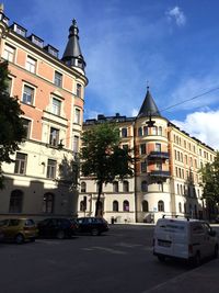 Road in city against sky