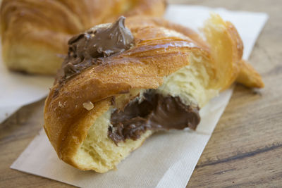 Close-up of croissant on table