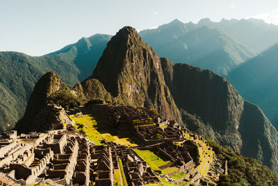 Machu picchu old inca ruins at sunrise in peru