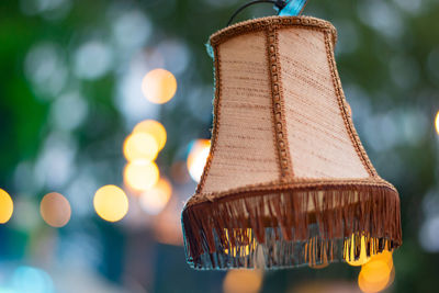 Close-up of illuminated lighting equipment