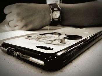 Close-up of a camera on table