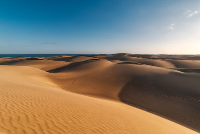 Scenic view of desert against sky