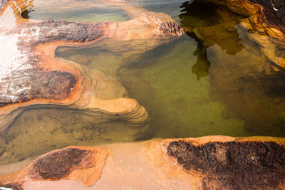 High angle view of rocks in water