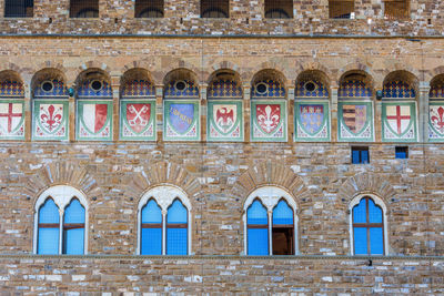 Wall with coats of arms on a palace