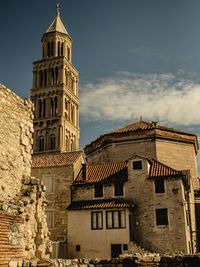 Low angle view of old building against sky