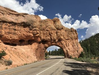 Rock formations on mountain against sky