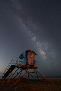 Scenic view of sea against sky at night