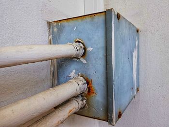 Close-up of metal pipe on wall