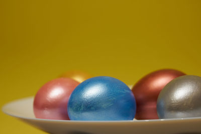 Close-up of multi colored candies on table