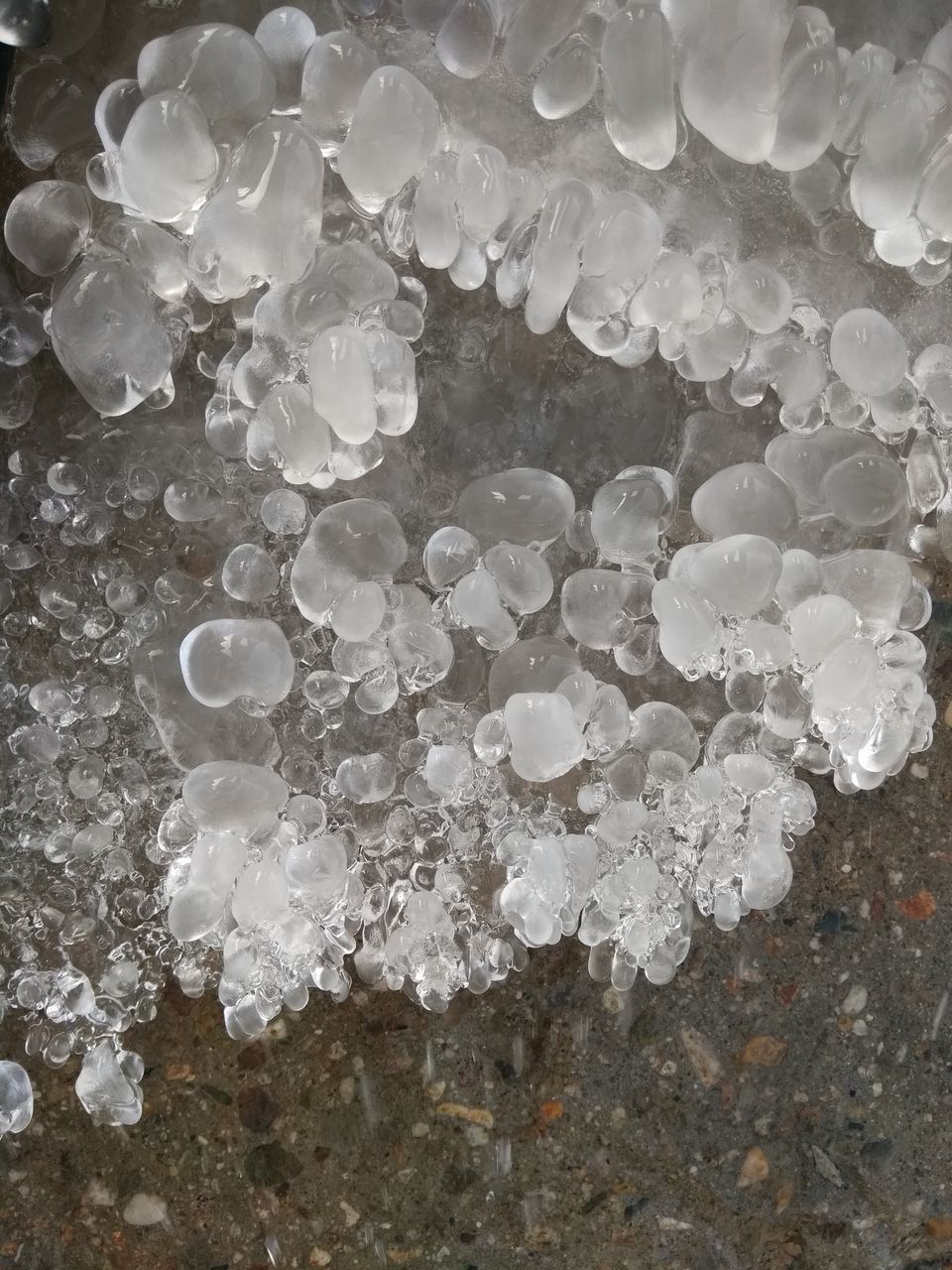 CLOSE-UP OF WATER FLOWING IN CONTAINER