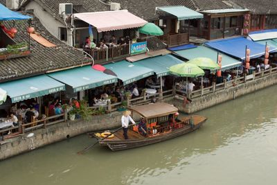 High angle view of boats moored on river