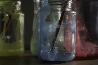 Close-up of glass jar on table