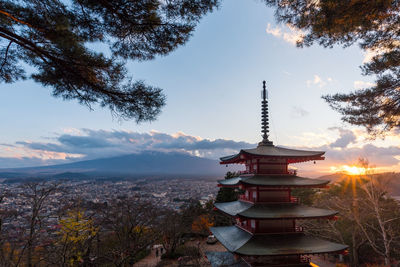 Chureito pagoda view with fuji mountain in autumn cloudy day