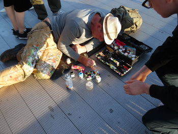 High angle view of men playing at table