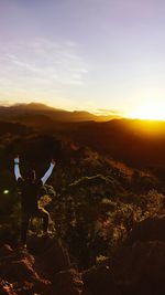 Scenic view of landscape against sky during sunset