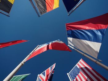 Low angle view of flag against sky