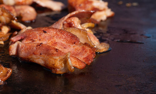 High angle view of meat on barbecue grill