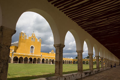 View of historic building against cloudy sky