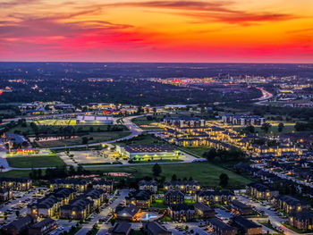 High angle view of townscape against sky during sunset