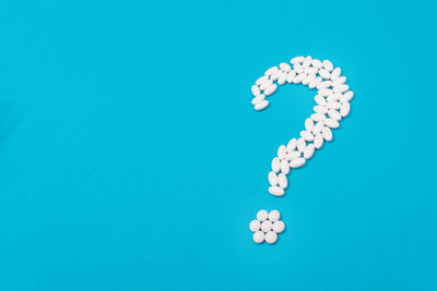 High angle view of painting on blue background