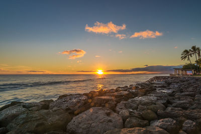 Scenic view of sea against sky during sunset