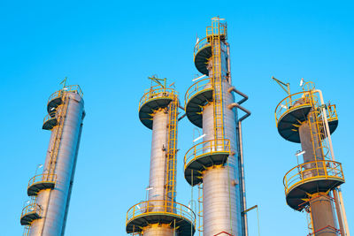 Detail at dusk of a natural gas refinery plant