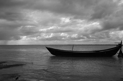 Boat in sea against sky