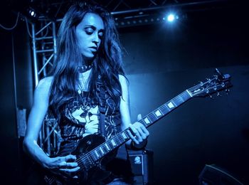 Young woman playing guitar