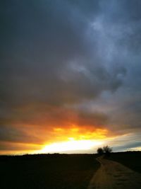 Scenic view of dramatic sky during sunset