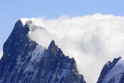 Scenic view of snow covered mountains