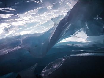 Close detail inside of an ice cave in switzerland