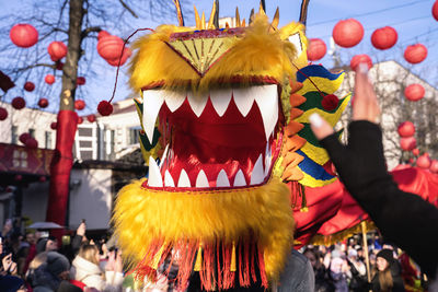 Dnipro, ukraine - 02 05 2022. dragon dance on the street of a european city, chinese new year