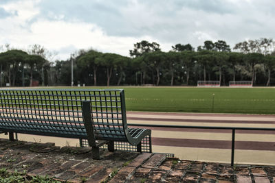 Empty bench in park