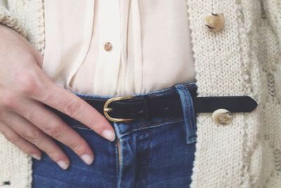 Woman wearing jeans and belt