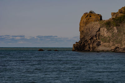 View of calm blue sea against sky