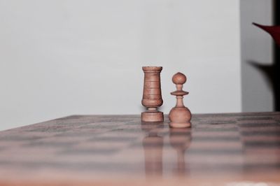 Close-up of chess pieces on board