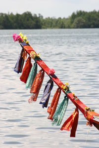 The locals bring the beautifully patterned cloth to the boat head.