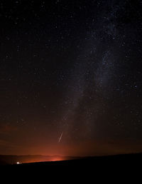 Scenic view of star field against sky at night