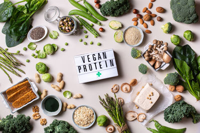 Variety of healthy vegan, plant based protein source and body building food. view from above